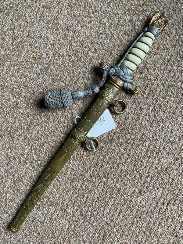 THIRD REICH NAVAL OFFICERS DAGGER BY EICKHORN WITH ORIGINAL KNOT AND MINT BLADE.