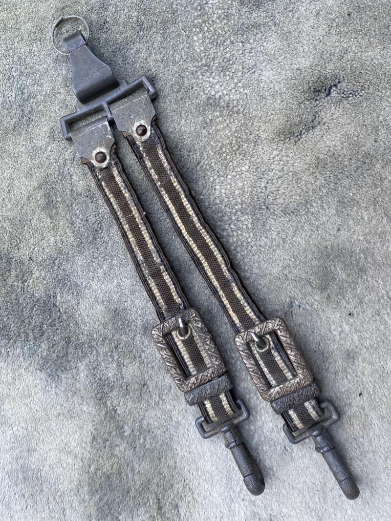 A NICE SET OF LUFTWAFFE DAGGER STRAPS WITH METAL TOPS.