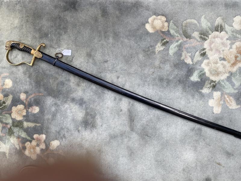 SWORD COLLECTION - A BRASS LIONS HEAD SWORD BY F.W.HOLLER