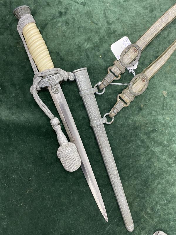 ARMY DAGGER COMPLETE WITH STRAPS AND KNOT.