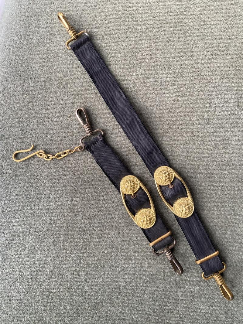 A NICE MATCHED SET OF NAVY DAGGER HANGERS.