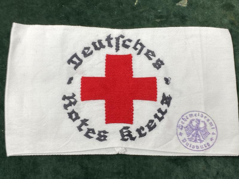 THIRD REICH RED CROSS MEMBERS ARMBAND WITH ISSUE STAMP.