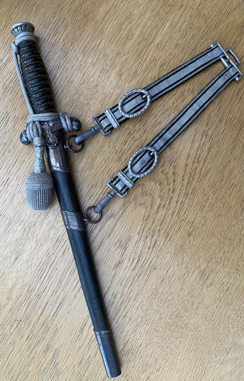 A SUPERB EXAMPLE OF A LAND CUSTOMS DAGGER BY WKC WITH HANGERS & KNOT.