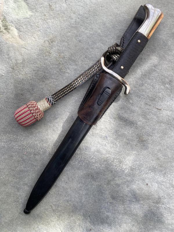 THIRD REICH FIREMAN’S SAW-BACK BAYONET WITH ORIGINAL PORTAPEE AND FROG.
