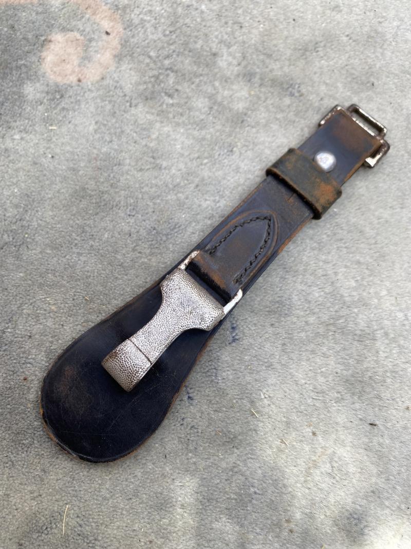 BLACK LEATHER ‘TEAR DROP’ SWORD HANGER.