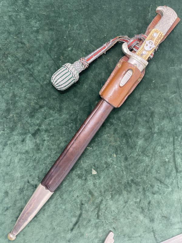 A LONG RURAL POLICE BAYONET BY ALCOSO  WITH FROG AND PORTEPEE.