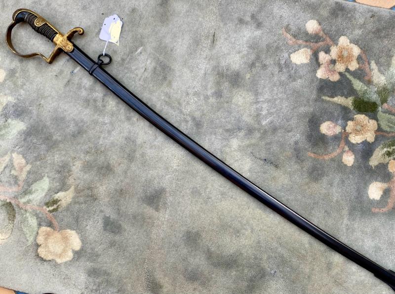 A VERY EARLY ALL BRASS ‘WRANGLE’ OFFICERS SWORD.
