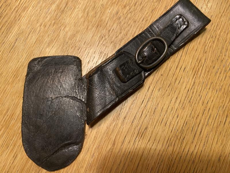 WONDERFUL VERY EARLY LEATHER HANGER FOR RAD HEWER.