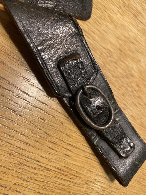 WONDERFUL VERY EARLY LEATHER HANGER FOR RAD HEWER.
