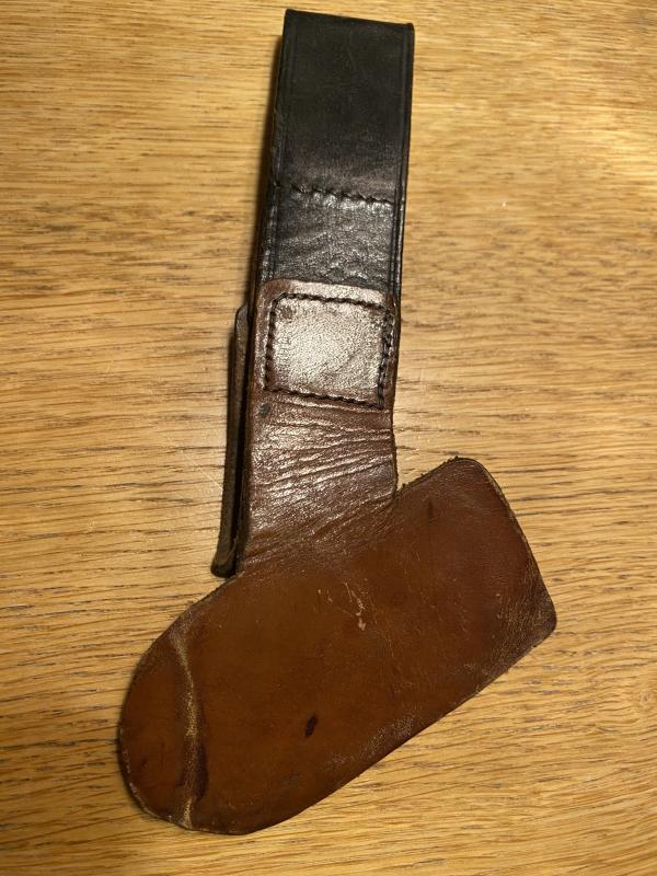 WONDERFUL VERY EARLY LEATHER HANGER FOR RAD HEWER.