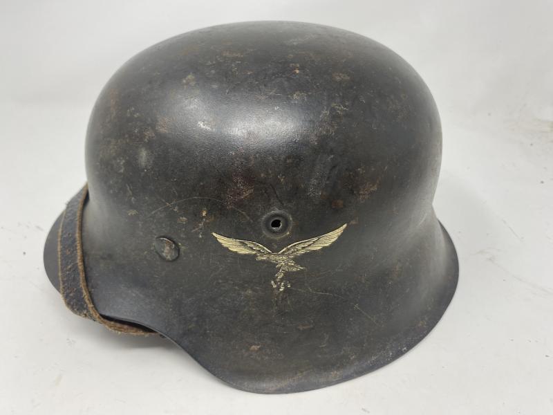THIRD REICH M42 ‘RAW EDGE’ LUFTWAFFE HELMET.