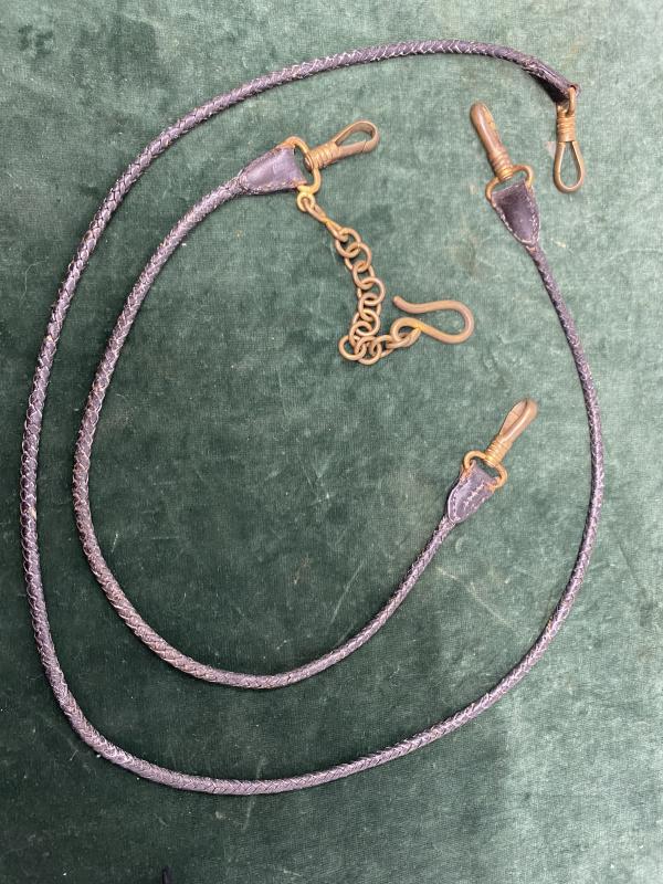 EXTREMELY RARE SET OF ‘DOG LEAD’ LEATHER HANGERS FOR NAVY SWORD.