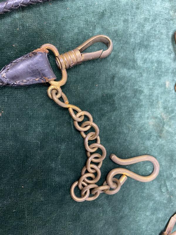 EXTREMELY RARE SET OF ‘DOG LEAD’ LEATHER HANGERS FOR NAVY SWORD.