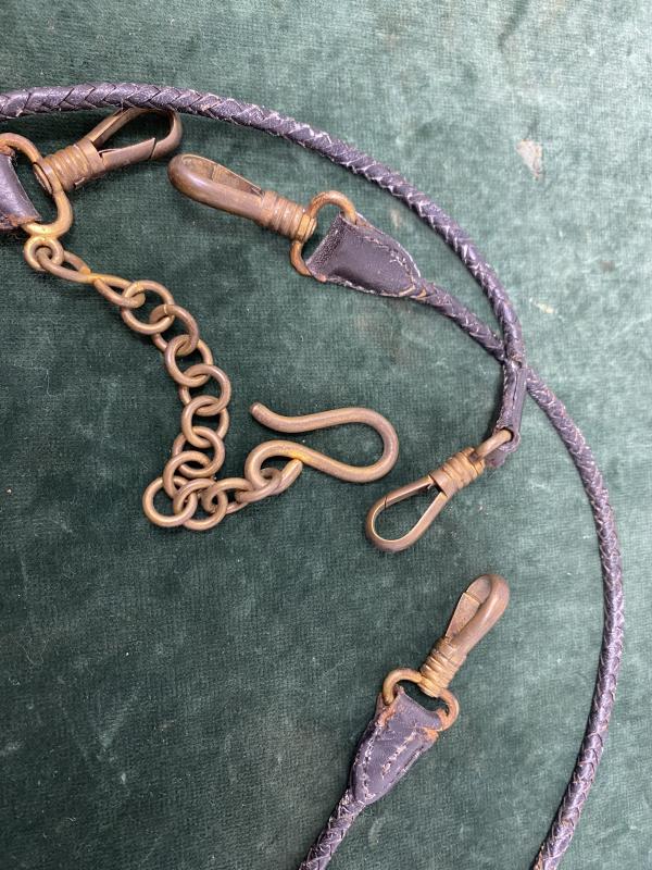 EXTREMELY RARE SET OF ‘DOG LEAD’ LEATHER HANGERS FOR NAVY SWORD.