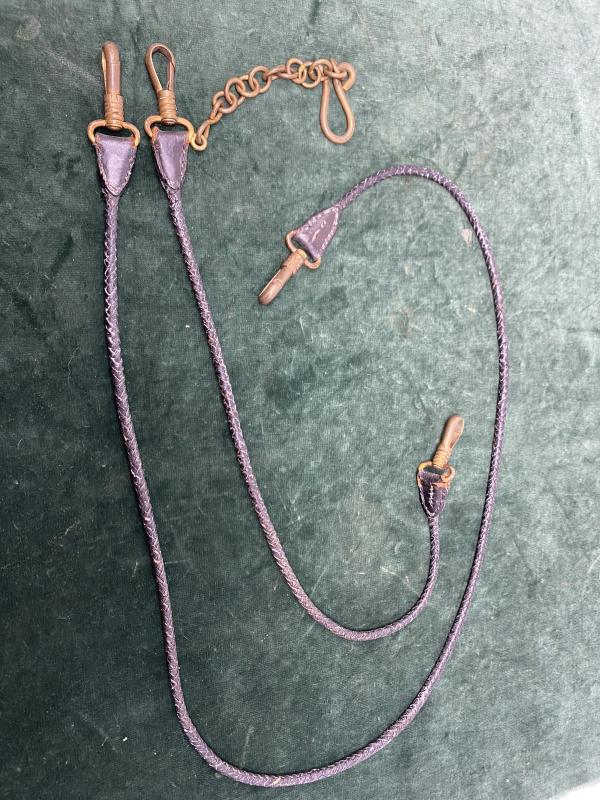 EXTREMELY RARE SET OF ‘DOG LEAD’ LEATHER HANGERS FOR NAVY SWORD.