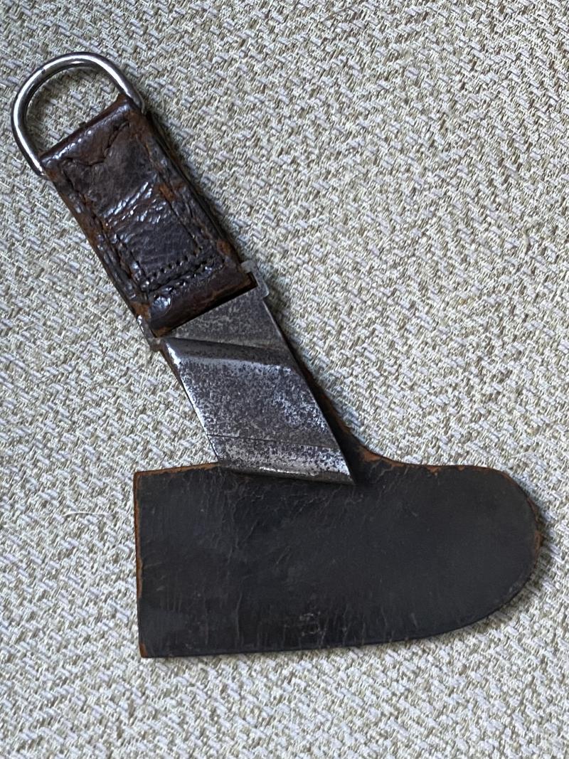 AN UNUSUAL, ORIGINAL HANGER FOR A RAD HEWER.