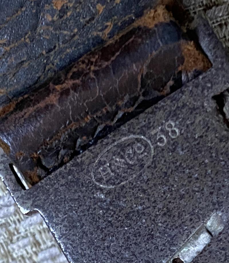 AN UNUSUAL, ORIGINAL HANGER FOR A RAD HEWER.