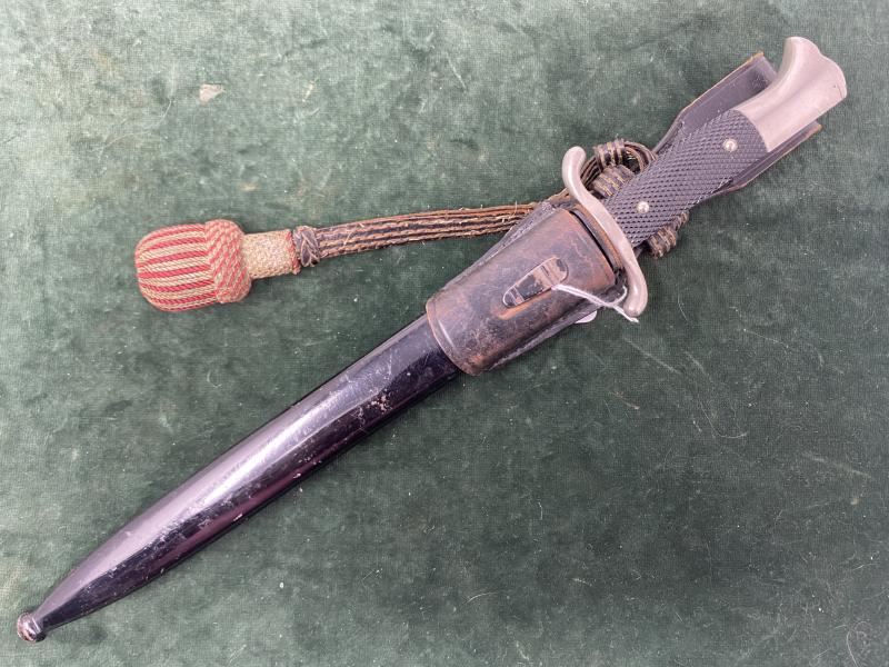 A LONG FIRE DRESS BAYONET COMPLETE WITH ORIGINAL FROG AND RARE PORTEPEE.