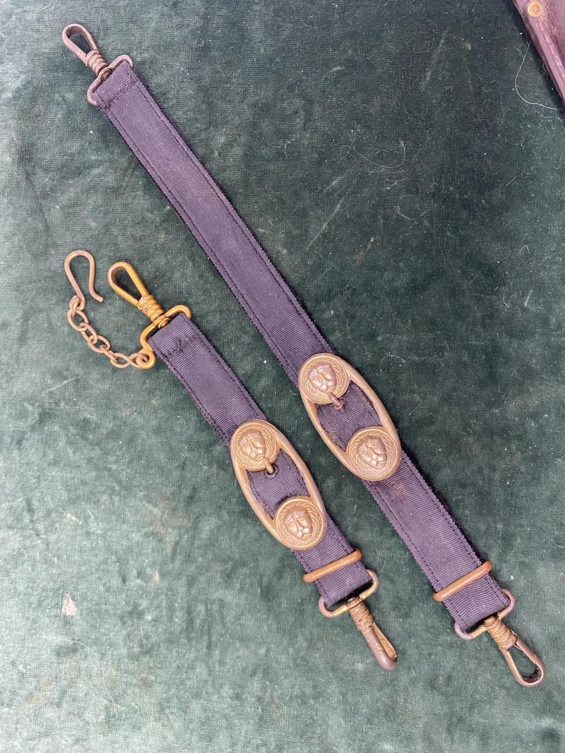 A SET OF MATCHING NAVAL DAGGER HANGERS.