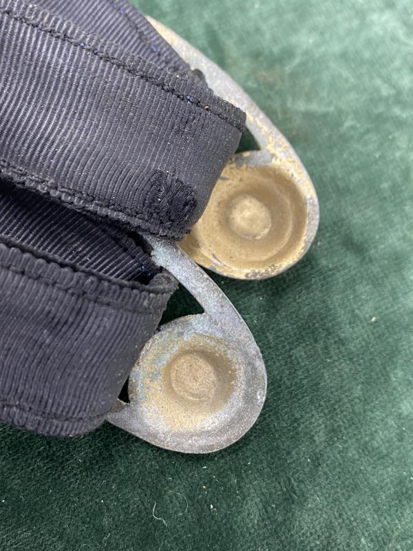 A SET OF MATCHING NAVAL DAGGER HANGERS.