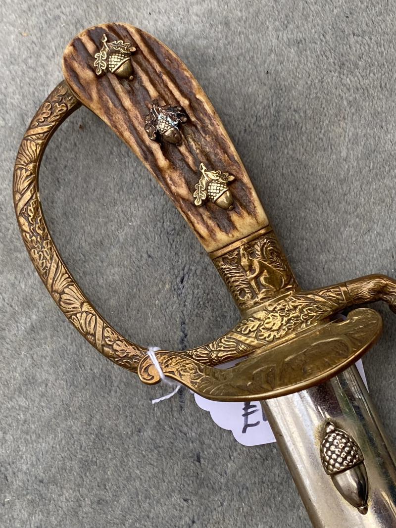 AN EARLY EICKHORN SUBORDINATE FORESTRY CUTLASS.