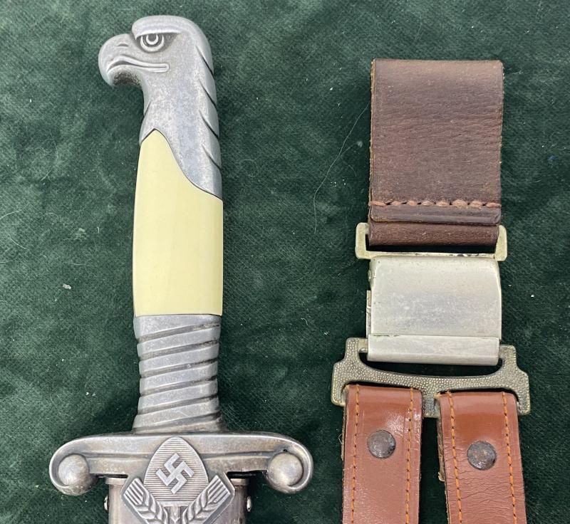 A NEAR PERFECT RAD OFFICERS DAGGER WITH VERY RARE MAKER AND WITH COMPLETE MINT HANGERS INCLUDING THE TOP CLIP!!.