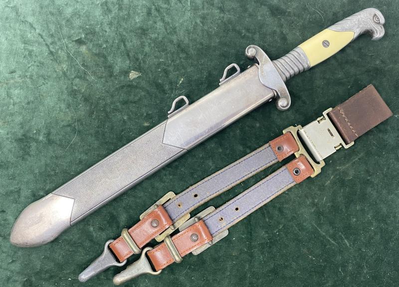 A NEAR PERFECT RAD OFFICERS DAGGER WITH VERY RARE MAKER AND WITH COMPLETE MINT HANGERS INCLUDING THE TOP CLIP!!.