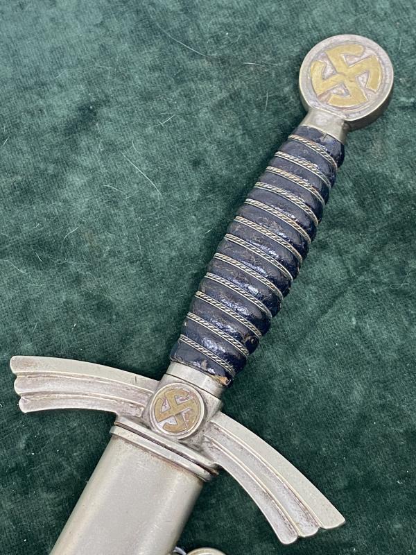 AN EARLY ALL NICKEL LUFTWAFFE 1st PATTN WITH UNIT MARKED BLADE.