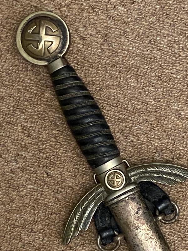 AN UNCLEANED & UNTOUCHED EARLY LUFTWAFFE SWORD BY HORSTER WITH FLIGHT AND DEPOT MARKINGS.