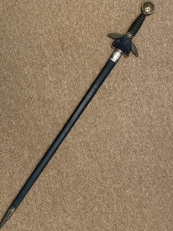 AN UNCLEANED & UNTOUCHED EARLY LUFTWAFFE SWORD BY HORSTER WITH FLIGHT AND DEPOT MARKINGS.