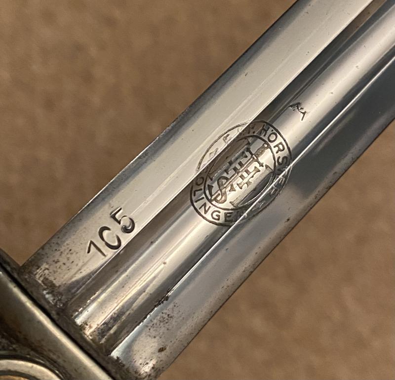 AN UNCLEANED & UNTOUCHED EARLY LUFTWAFFE SWORD BY HORSTER WITH FLIGHT AND DEPOT MARKINGS.