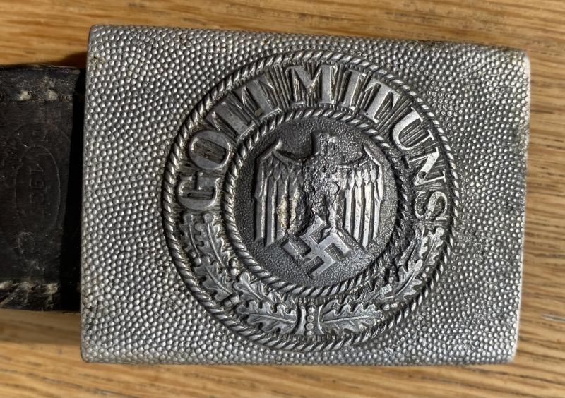 WEHRMACHT ALLOY BELT BUCKLE AND LEATHER TAB.