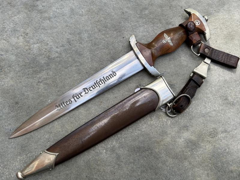 A WONDERFUL EXAMPLE OF AN EARLY SA DAGGER BY EICKHORN WITH FULLY ERASED ROHM DEDICATION AND A COMPLETE  3-PIECE HANGER.