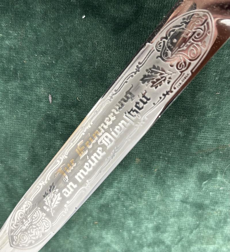 A SHORT SINGLE ETCH ‘MEMORY OF MY SERVICE TIME’ DRESS BAYONET BY PUMA.