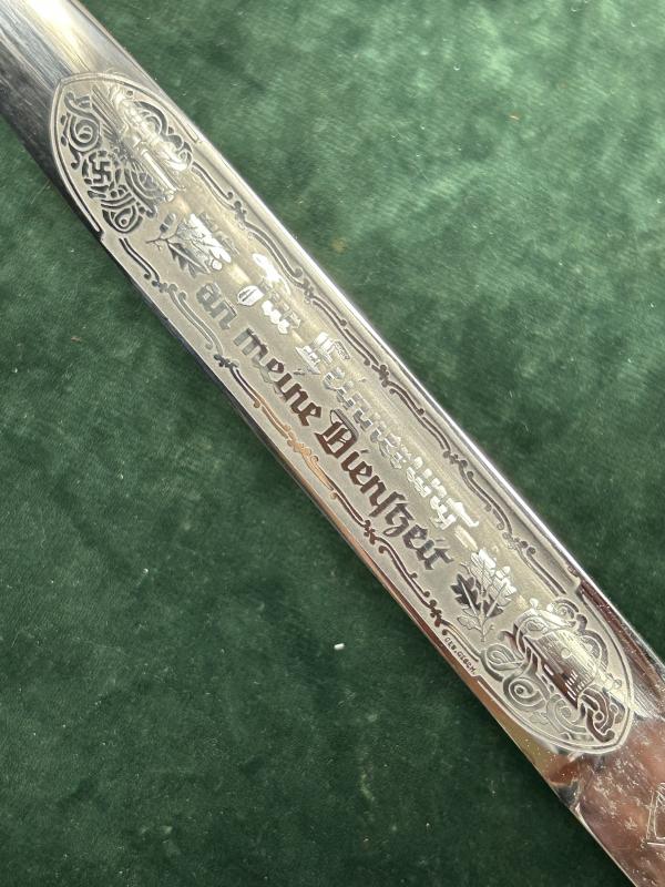 A SHORT SINGLE ETCH ‘MEMORY OF MY SERVICE TIME’ DRESS BAYONET BY PUMA.