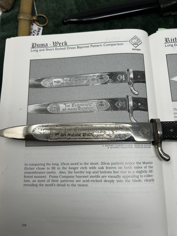A SHORT SINGLE ETCH ‘MEMORY OF MY SERVICE TIME’ DRESS BAYONET BY PUMA.