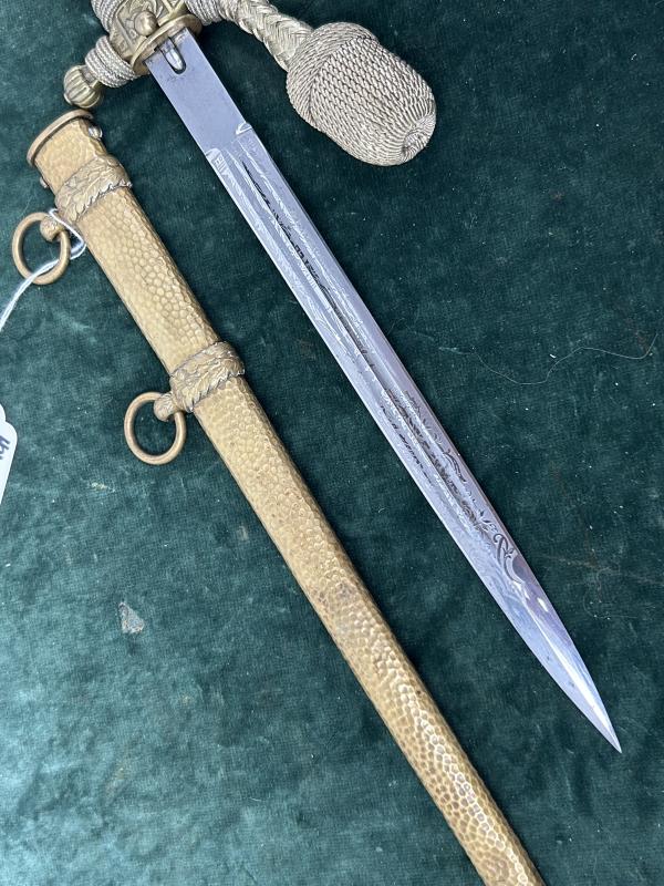 THIS IS THE NAVY DAGGER ALL COLLECTORS WANT. ORANGE GRIP, GOLD PORTAPEE, HAMMERED SCABBARD AND SAILING SHIP ETCHED BLADE!!!