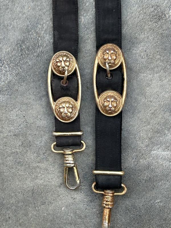 A GOOD, MATCHED SET OF THIRD REICH NAVY DAGGER HANGERS.