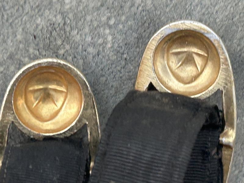 A GOOD, MATCHED SET OF THIRD REICH NAVY DAGGER HANGERS.