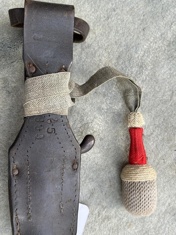 WW1/IMPERIAL GERMAN 1898/05 SAWBACK BAYONET WITH FROG AND KNOT.