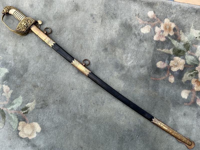 A NAMED IMPERIAL GERMAN NAVAL SWORD BY WK&C. FULLY ETCHED BLADE ETC.