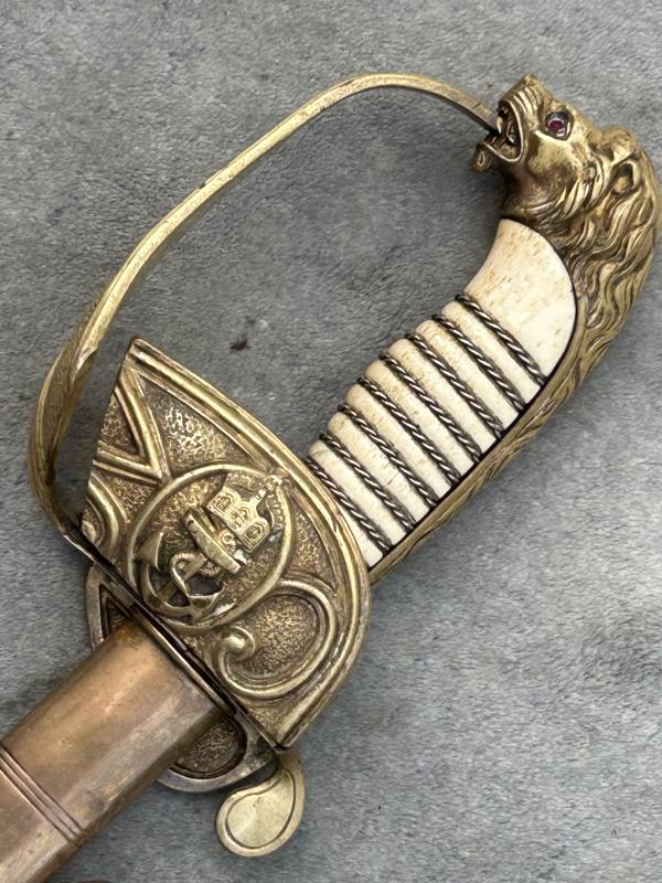 A NAMED IMPERIAL GERMAN NAVAL SWORD BY WK&C. FULLY ETCHED BLADE ETC.