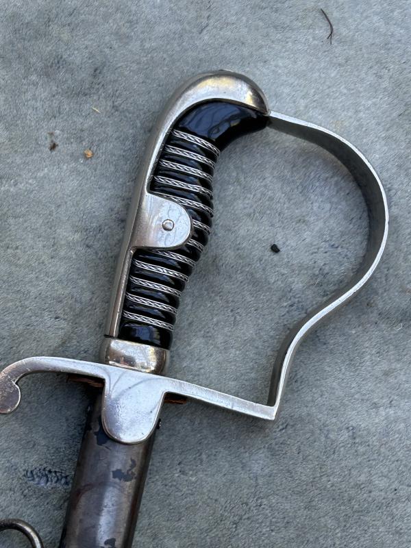 A MOST UNUSUAL THIRD REICH ERA SWORD DEDICATED TO AMERICAN SERVICEMAN IN MEMORIAM.