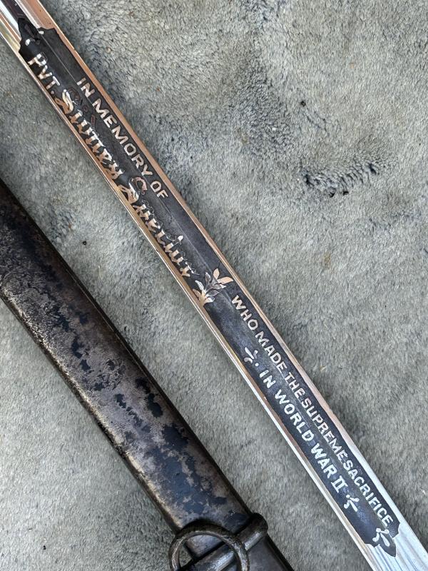 A MOST UNUSUAL THIRD REICH ERA SWORD DEDICATED TO AMERICAN SERVICEMAN IN MEMORIAM.