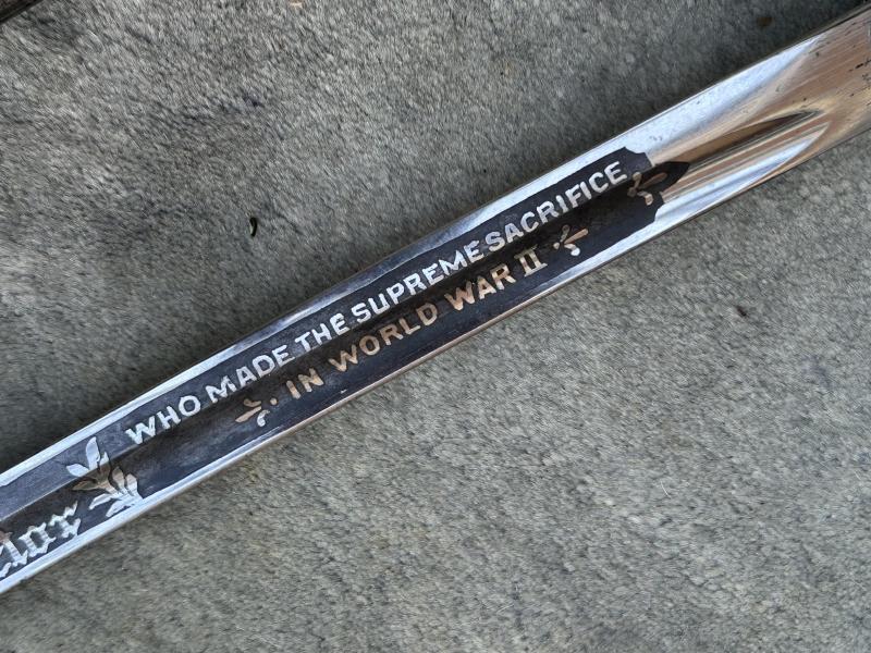 A MOST UNUSUAL THIRD REICH ERA SWORD DEDICATED TO AMERICAN SERVICEMAN IN MEMORIAM.