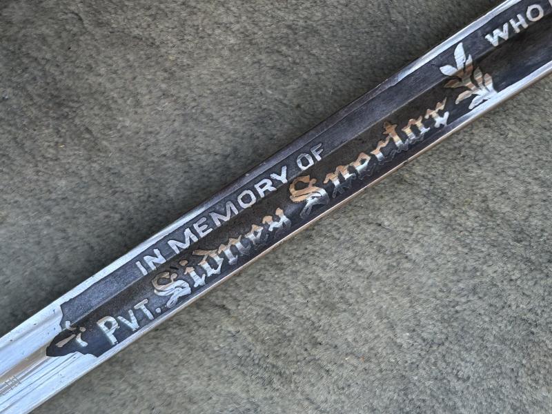 A MOST UNUSUAL THIRD REICH ERA SWORD DEDICATED TO AMERICAN SERVICEMAN IN MEMORIAM.
