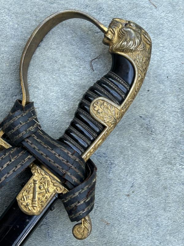 EARLY THIRD REICH ARTILLERY OFFICERS LIONS HEAD SWORD BY EICKHORN.