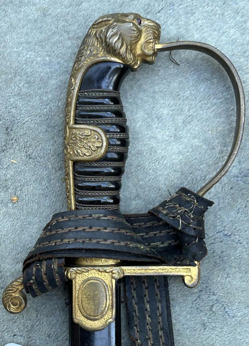 EARLY THIRD REICH ARTILLERY OFFICERS LIONS HEAD SWORD BY EICKHORN.