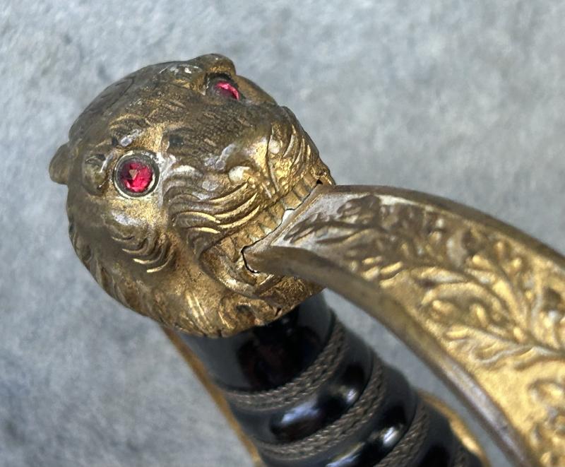 EARLY THIRD REICH ARTILLERY OFFICERS LIONS HEAD SWORD BY EICKHORN.