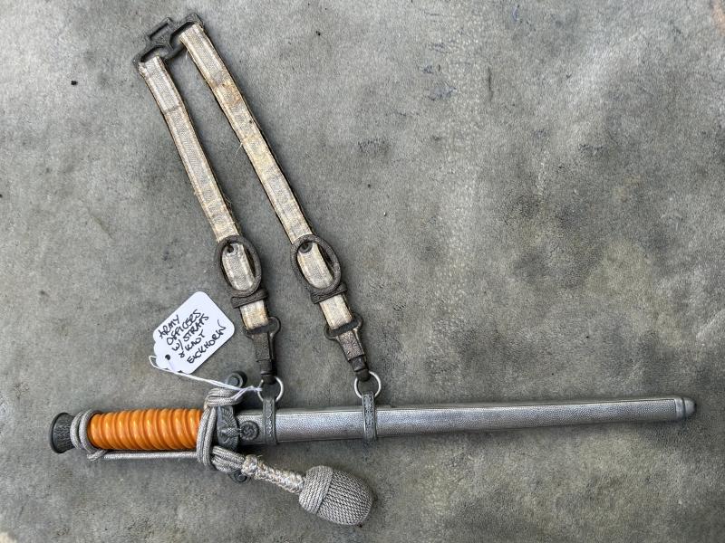 A COMPLETE ARMY DAGGER BY EICKHORN WITH STRAPS AND KNOT.